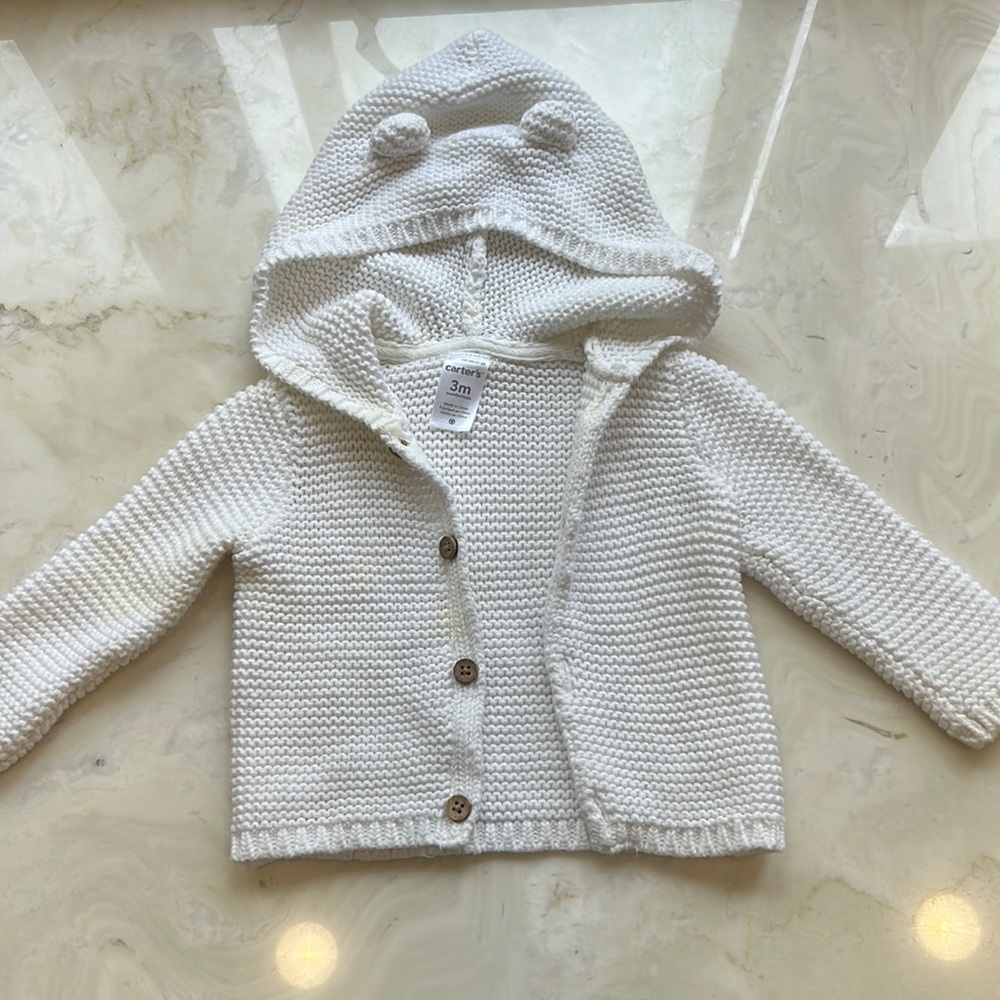 White hooded sweater